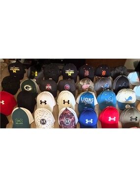 Under Armour Mixed Team Logo Caps -  all New!!! Except the white one in the midd